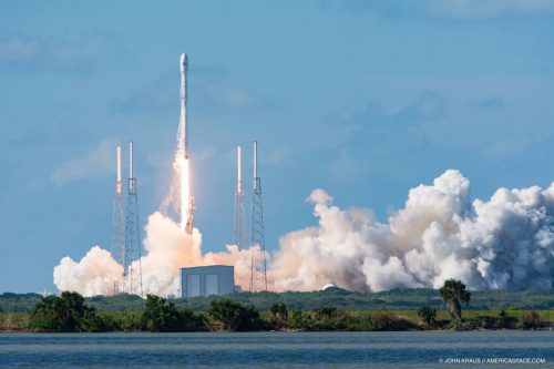 The 25th Falcon 9 rises between the four lightning towers of Space Launch Complex (SLC)-40 on its mission to deliver Thaicom 8 to orbit. Photo Credit: John Kraus/AmericaSpace