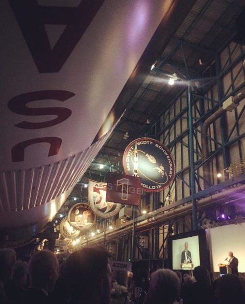 Underneath the Saturn V rocket and Space Shuttle Atlantis, veteran spacefarers Brian Duffy and Scott Parazynski were inducted into the Astronaut Hall of Fame (AHOF) over the weekend. Photo Credit: Talia Landman