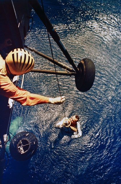 Shepard is winched to safety in the minutes after Freedom 7 splashed into the Atlantic Ocean. Photo Credit: NASA