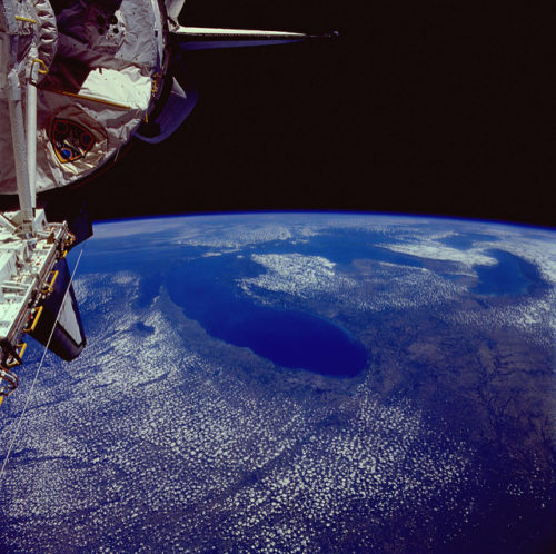 Carrying the bus-sized Spacelab module in her payload bay, Columbia drifts above Earth in June 1991. Photo Credit: NASA