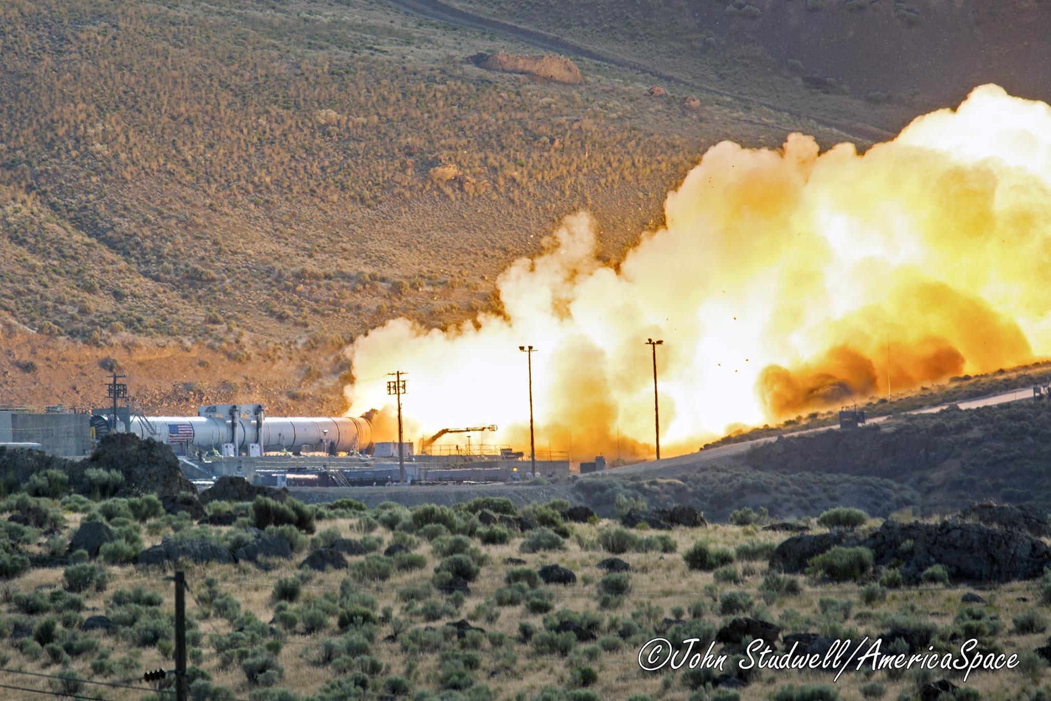booster for the most powerful rocket in the world, NASA’s Space Launch System (SLS), successfully fired up Tuesday for its second qualification ground test at Orbital ATK's test facilities in Promontory, Utah. This was the last full-scale test for the booster before SLS’s first uncrewed test flight with NASA’s Orion spacecraft in late 2018, a key milestone on the agency’s Journey to Mars. Photo Credit: John Studwell / AmericaSpace