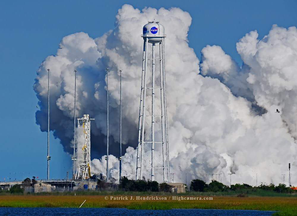 Clouds of smoke billow above Pad 0A at the Mid-Atlantic Regional Spaceport (MARS). Following the ORB-3 failure in October 2014, repairs and modifications to the pad were completed in the fall of 2015. Photo Credit: Patrick J. Hendrickson/Highcamera.com