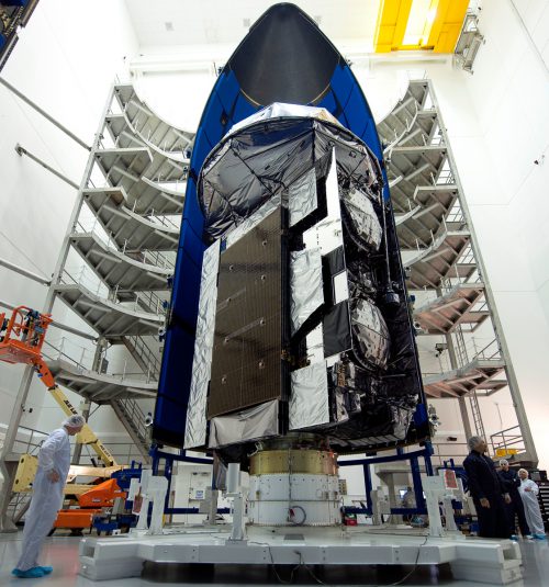 MUOS-5 being encapsulated in its launch fairings. Photo Credit: ULA