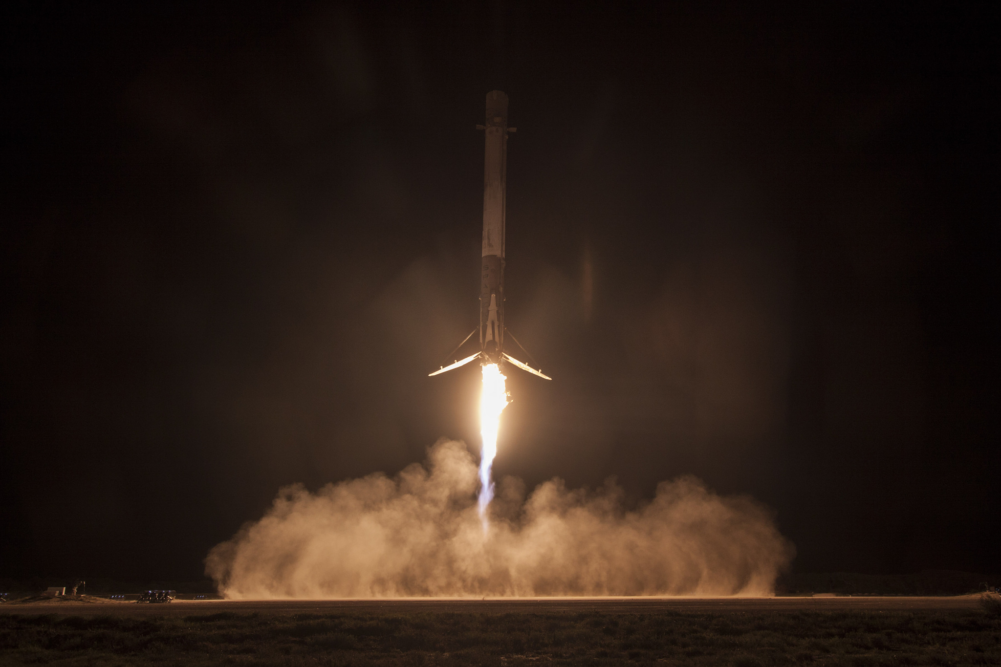 The Falcon-9 returns after launching Dragon on the CRS-9 resupply mission to the ISS for NASA. Photo Credit: SpaceX