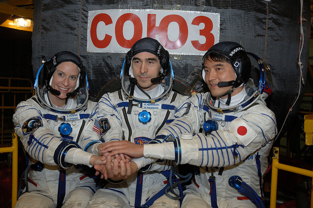 Commanded by veteran cosmonaut Anatoli Ivanishin (center), the Soyuz MS-01 crew is rounded out by "rookie" spacefarers Kate Rubins (left) of NASA and Takuya Onishi (right) of the Japan Aerospace Exploration Agency (JAXA). Photo Credit: NASA