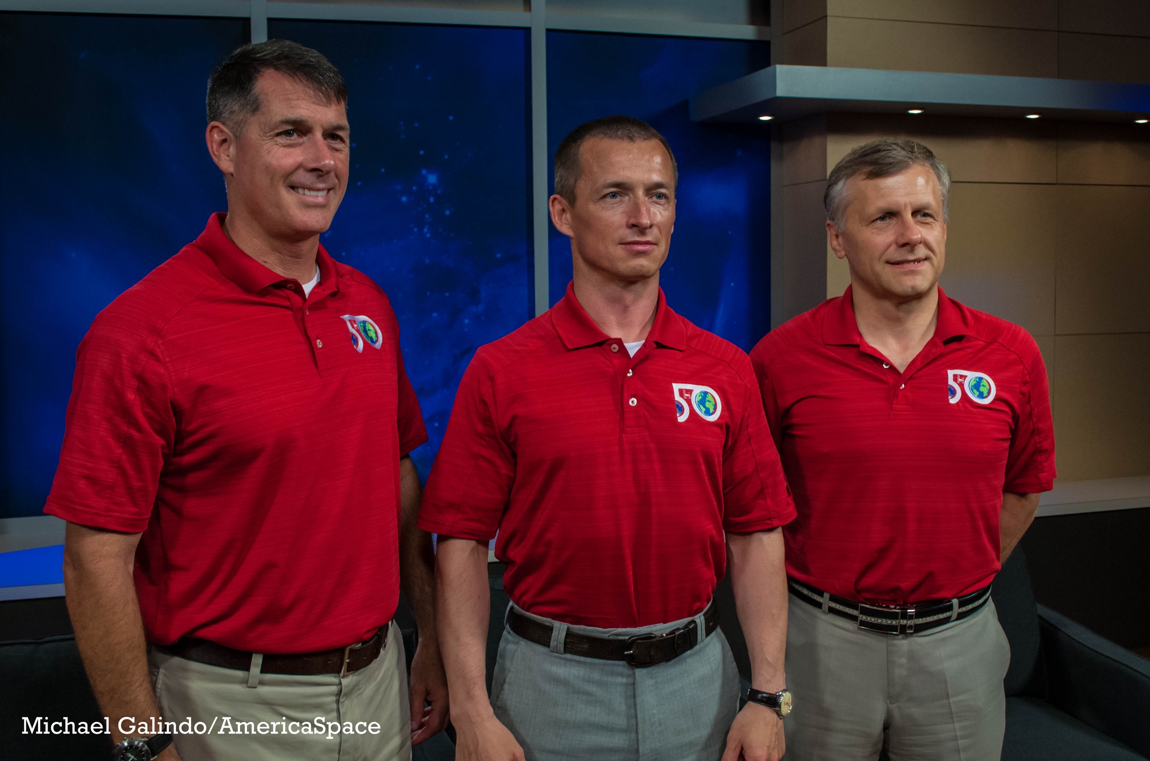 Standing in the same configuration that they will occupy in the Soyuz MS-02 spacecraft are (from left) Flight Engineer-2 Shane Kimbrough, Commander Sergei Ryzhikov and Flight Engineer-1 Andrei Borisenko. Photo Credit: Michael Galindo/AmericaSpace