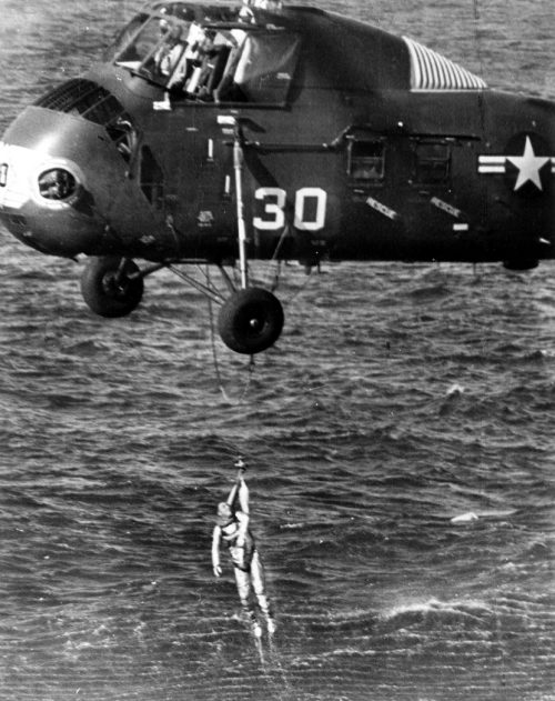 After several minutes in the water, and having come close to drowning, Grissom is winched out of the Atlantic to safety. Photo Credit: NASA, via Joachim Becker/SpaceFacts.de