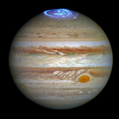 A spectacular image of auroras in Jupiter's northern hemisphere, taken by the Hubble Space Telescope in the spring of 2014. Photo Credit: NASA/ESA
