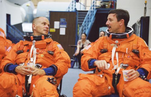 Commander Scott "Doc" Horowitz (right) and Pilot Rick "C.J." Sturckow confer during a training session in April 2001. Photo Credit: NASA