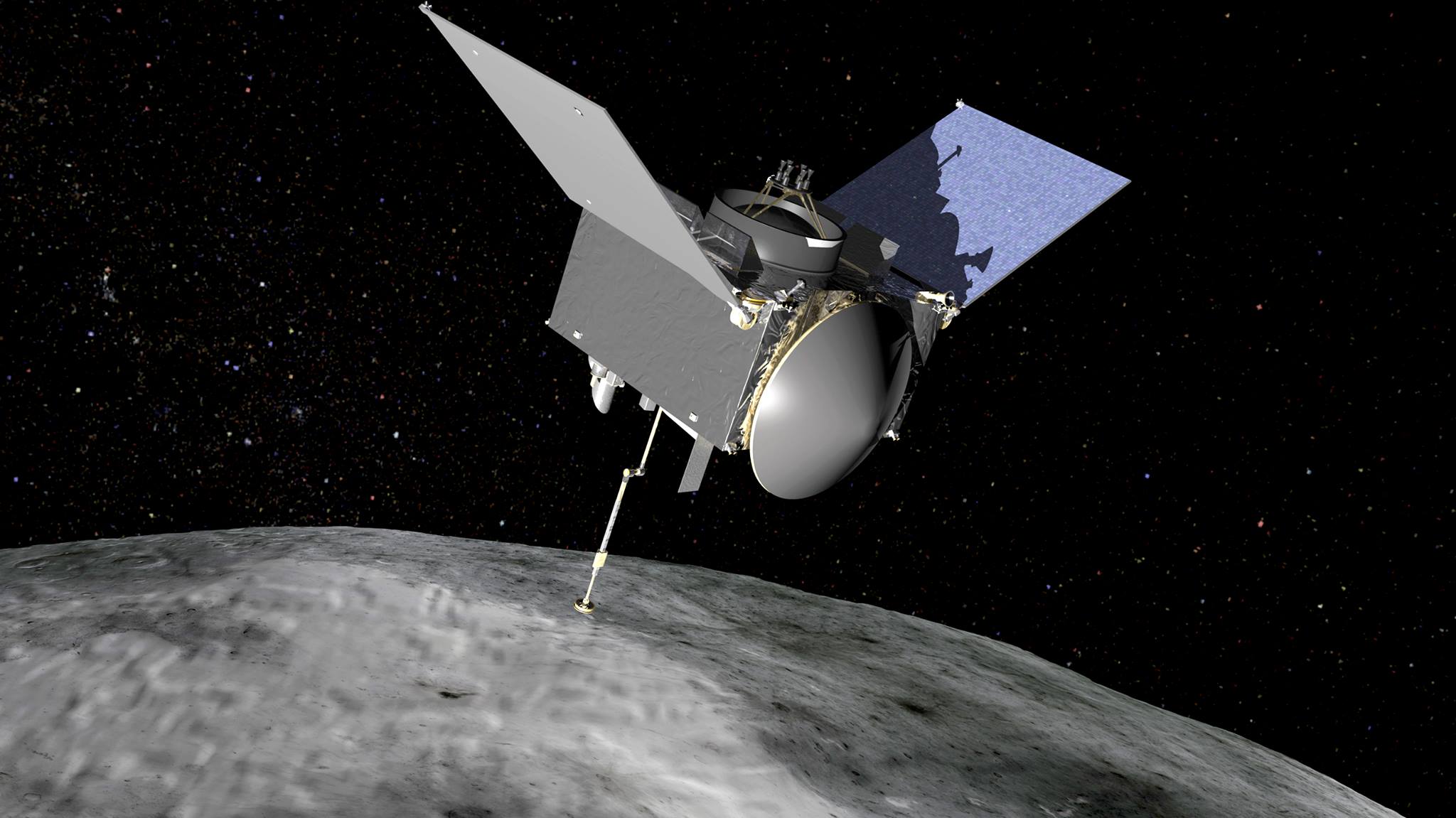 An artist's rendering of OSIRIS-REx at asteroid 101955 Bennu. Its solar arrays will be configured in a "Y-wing" shape to avoid dust accumulation. Image Credit: NASA