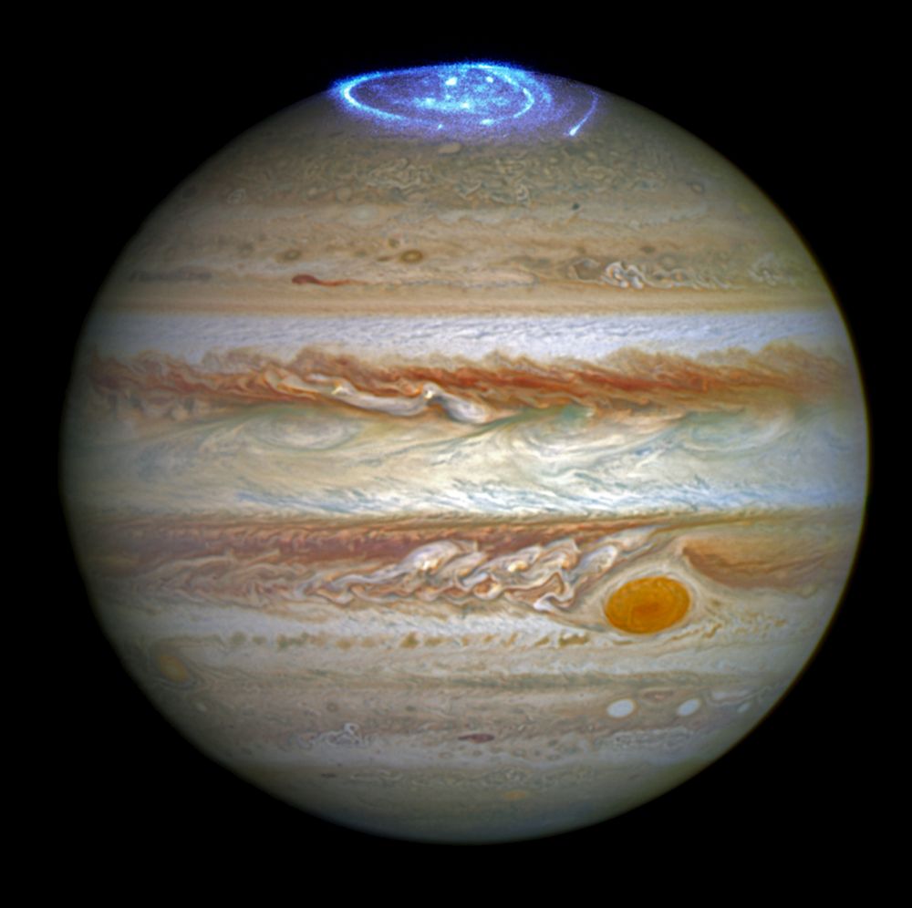 While this is not a Juno image, this does show Jupiter's auroras. From NASA: "Astronomers are using NASA's Hubble Space Telescope to study auroras — stunning light shows in a planet's atmosphere — on the poles of the largest planet in the solar system, Jupiter." Image Credit: NASA, ESA, and J. Nichols (University of Leicester)