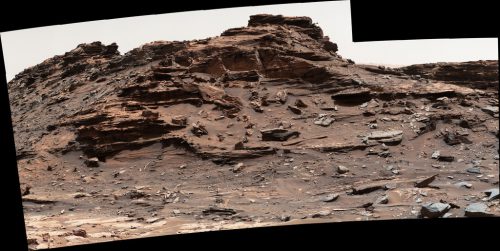One of the buttes in Murray Buttes, called M9a, which stands about 16 feet (5 meters) above the rover and about 82 feet (25 meters) east-southeast of the rover. The image has been white-balanced to show how the scene would look in daytime lighting conditions on Earth. Image Credit: NASA/JPL-Caltech/MSSS