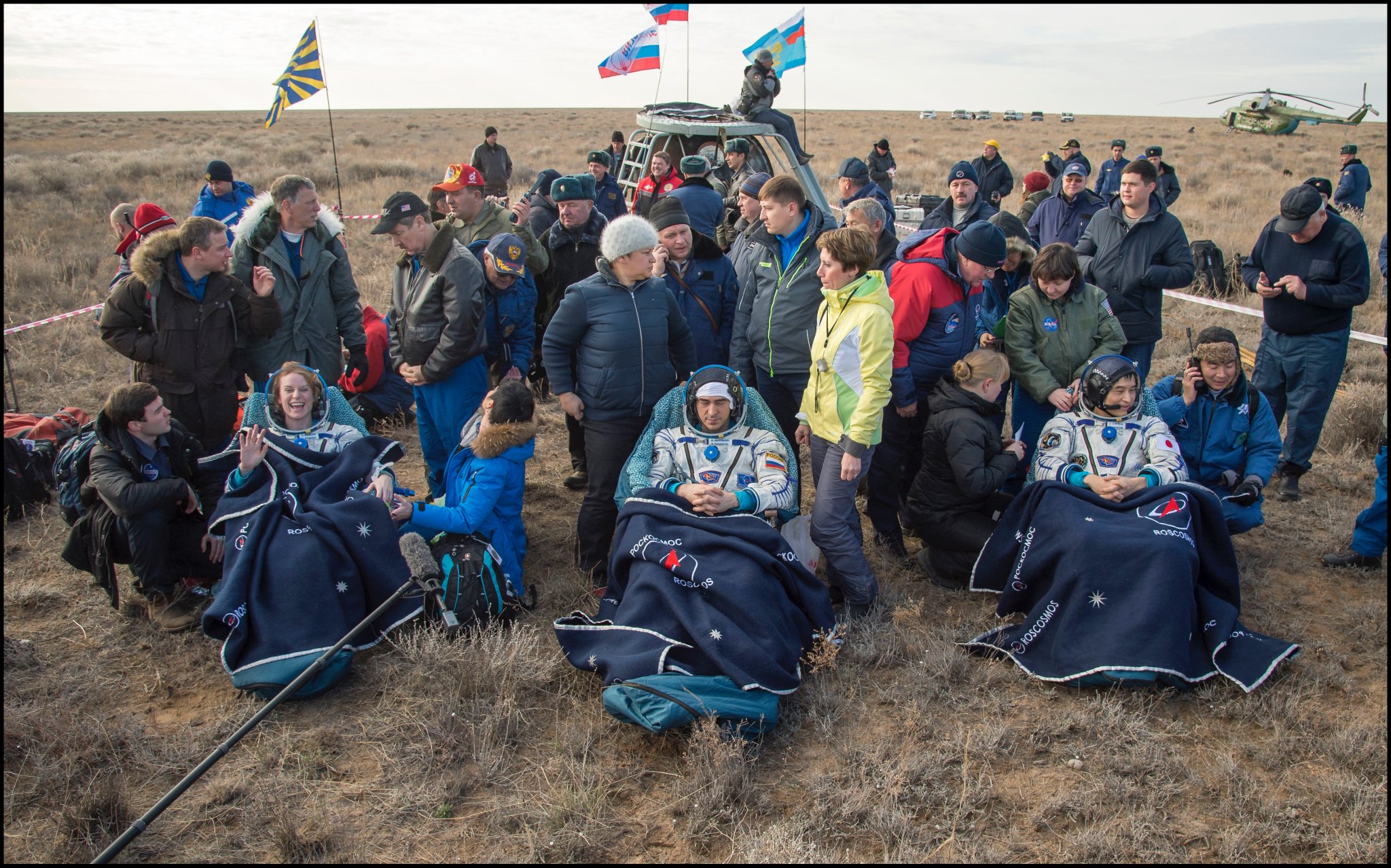 The Expedition 49 crew re-adjust to terrestrial gravity and the sights, sounds and scents of Earth, after landing in Kazakhstan. From left are Kate Rubins, Anatoli Ivanishin and Takuya Onishi. Photo Credit: NASA
