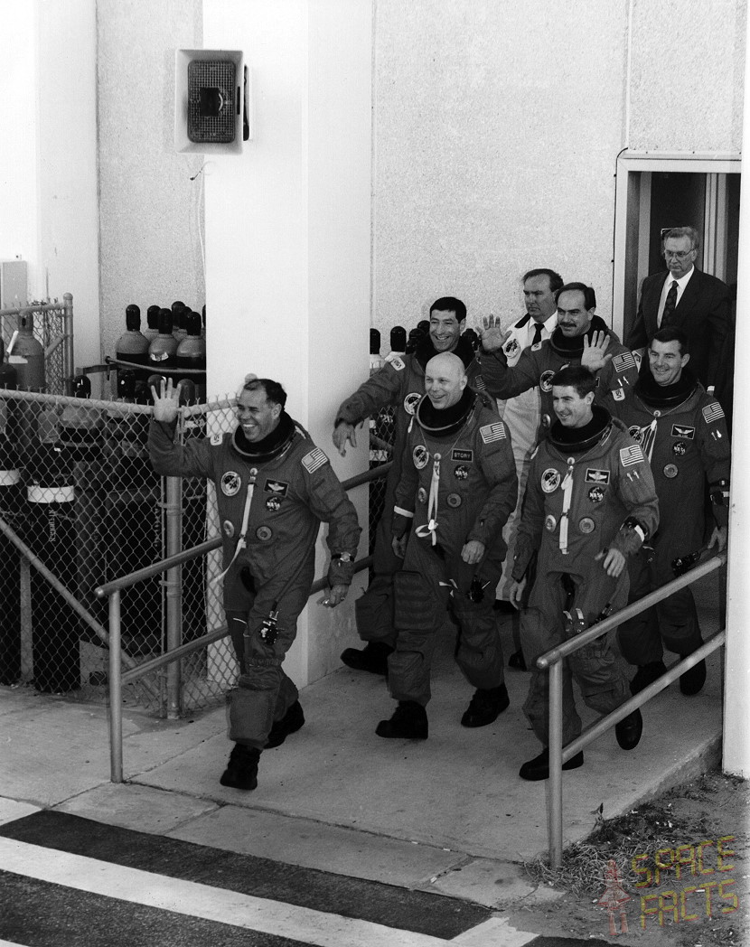 Fred Gregory leads the STS-44 crew out of the Operations & Checkout (O&C) Building at the Kennedy Space Center (KSC), 25 years ago, this week. Photo Credit: NASA, via Joachim Becker/SpaceFacts.de