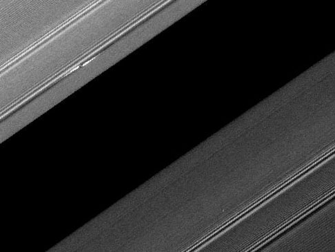 One of the bright "propeller" features in Saturn's A ring (upper left). Photo Credit: NASA/JPL/Space Science Institute