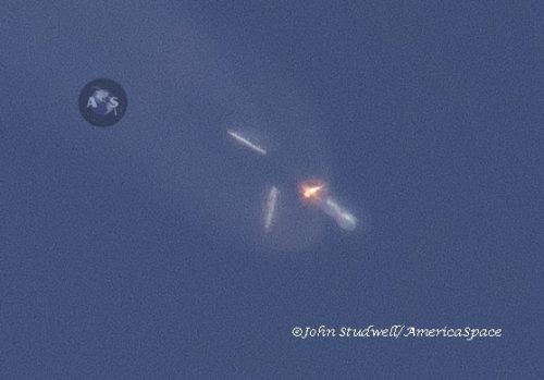 The three solids are jettisoned, some two minutes into Sunday afternoon's flight. Photo Credit: John Studwell/AmericaSpace