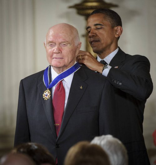 President Barack Obama presents former United States Marine Corps pilot, astronaut, and United States Senator John Glenn with a Medal of Freedom, Tuesday, May 29, 2012, during a ceremony at the White House in Washington. Photo Credit: (NASA/Bill Ingalls)