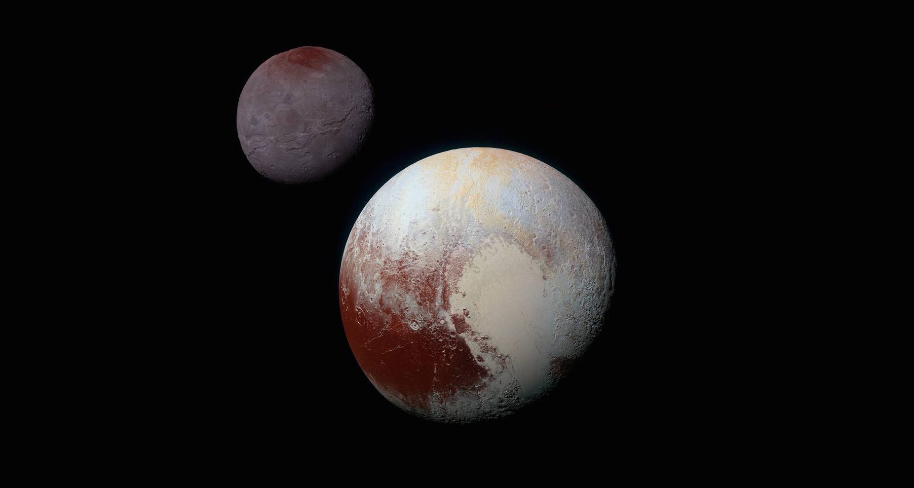 Charon (upper left) and Pluto as seen by New Horizons on July 14, 2015. Photo Credit: NASA/Johns Hopkins University Applied Physics Laboratory/Southwest Research Institute