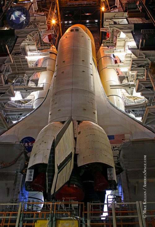 Space shuttle Atlantis and levels of shuttle-specific work platforms in the VAB, processing to fly mission STS-135. Photo Credit: Mike Killian / AmericaSpace