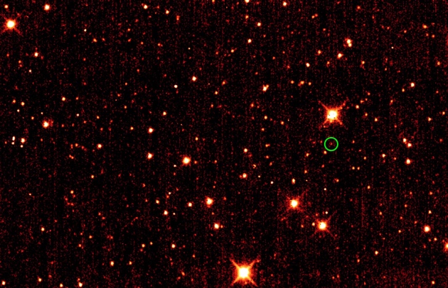 One of the Trojan asteroids (circled) as seen from Earth, just a dot of light. Lucy will get a first-ever close-up look in 2027. Image Credit: NASA/JPL-Caltech/UCLA