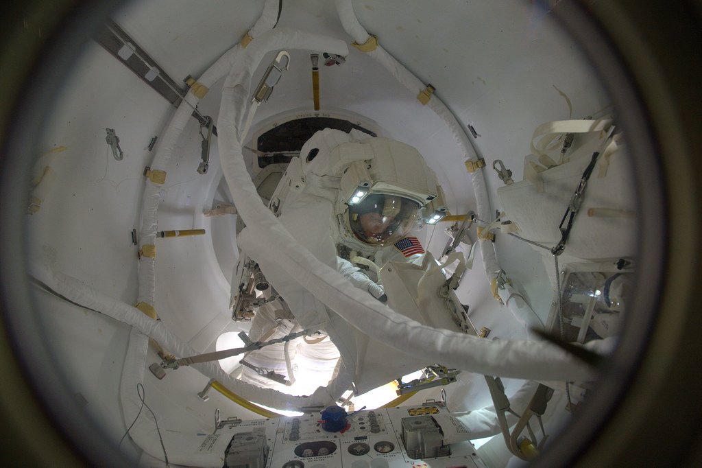 Peggy Whitson heads out of the Quest airlock to tie Sunita Williams' record for the greatest number of spacewalks by a woman. Photo Credit: NASA/Thomas Pesquet/Twitter